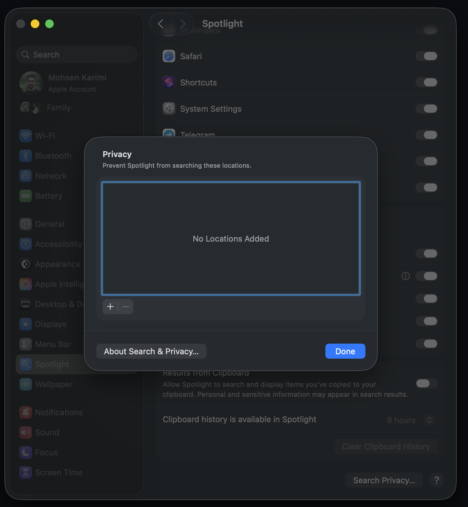 The empty Spotlight Privacy dialog with an arrow pointing to the plus button at the bottom left of the list.