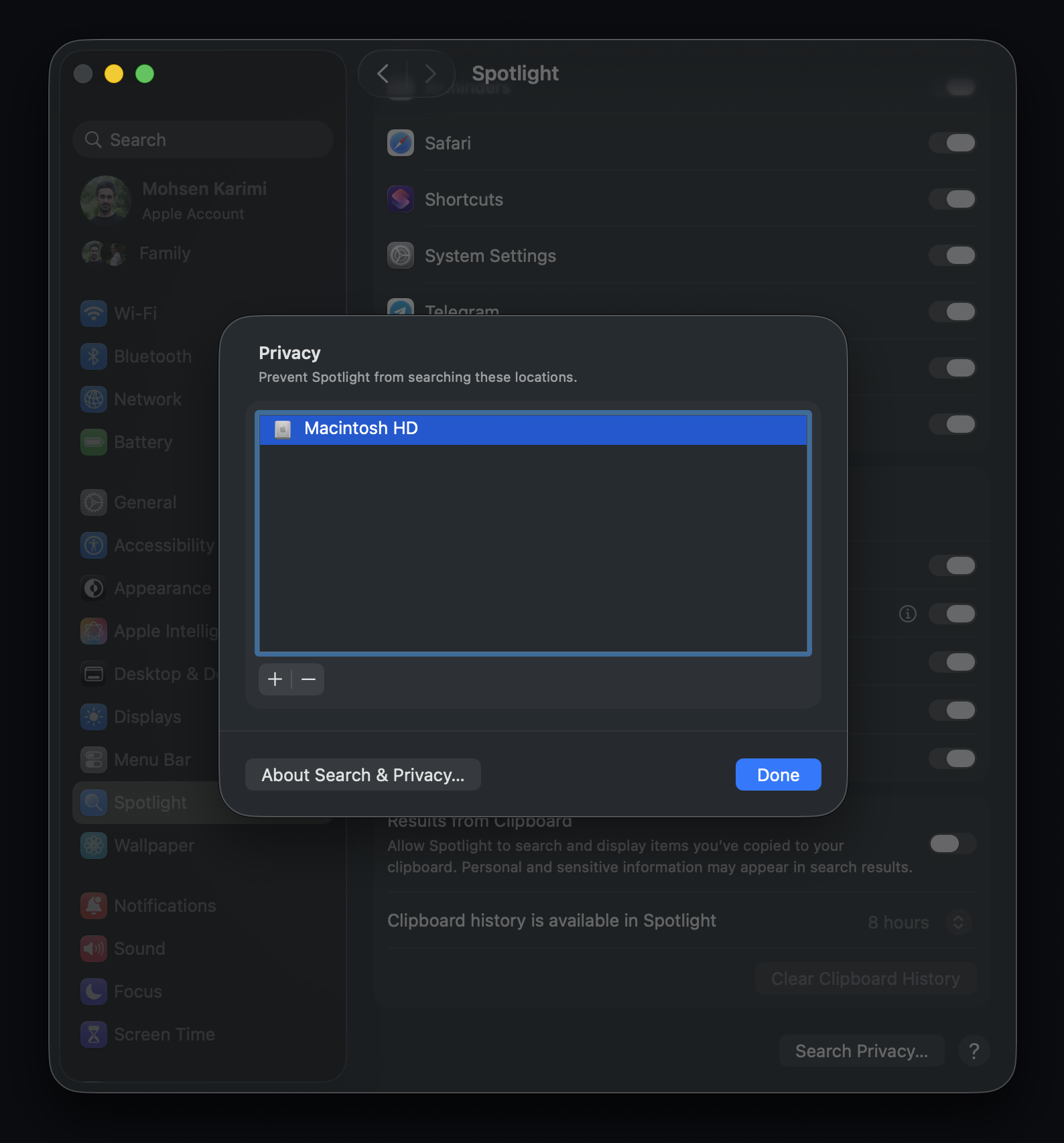 Spotlight Privacy showing Macintosh HD selected, with arrows pointing to Done and the minus button.